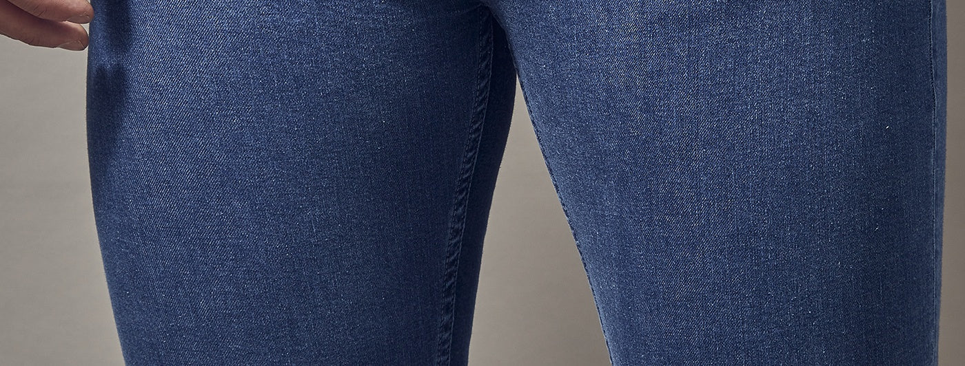 http://taperedmenswear.com/cdn/shop/articles/How_to_Stretch_Jeans.jpg?v=1692952572