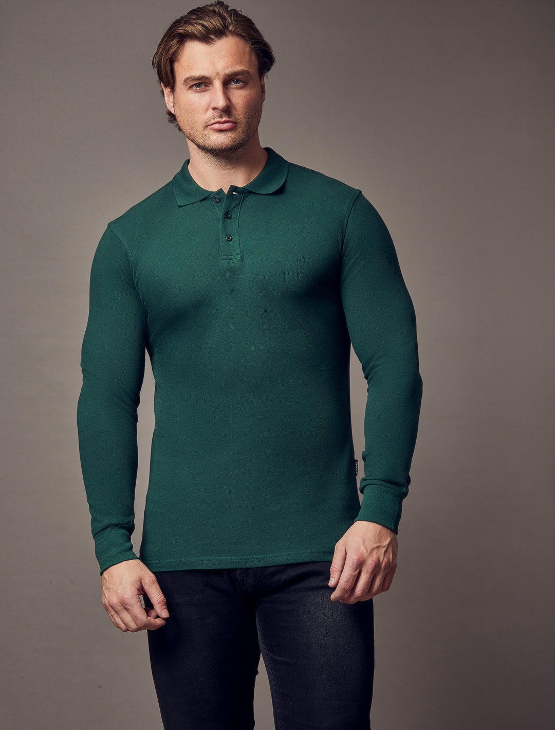 Green long-sleeve polo shirt with a tapered fit from Tapered Menswear, highlighting muscle fit attributes for a flattering and well-defined appearance.