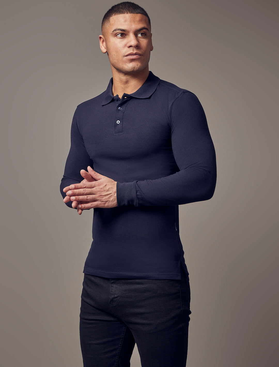  Navy muscle-fit polo shirt from Tapered Menswear, emphasizing its tapered design and high-quality craftsmanship.