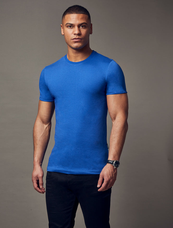 indigo blue tapered fit t-shirt by Tapered Menswear, showcasing the muscle fit design for a comfortable and well-sculpted appearance