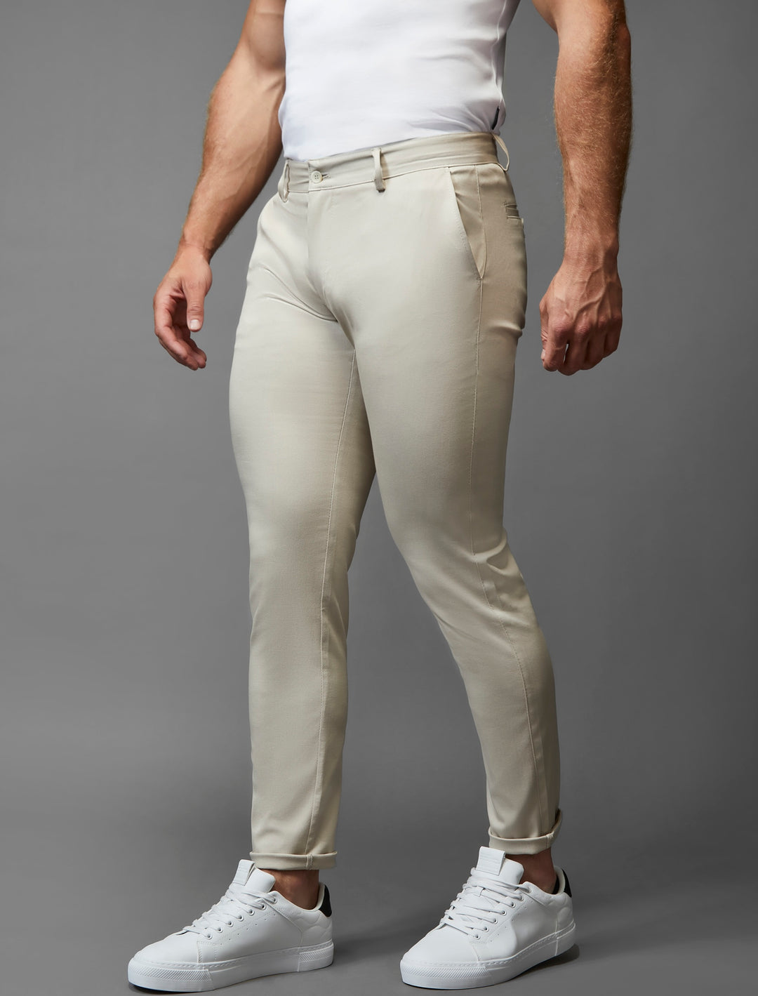 Tapered Menswear's beige chinos in an athletic fit, crafted with stretch for a dynamic wear.