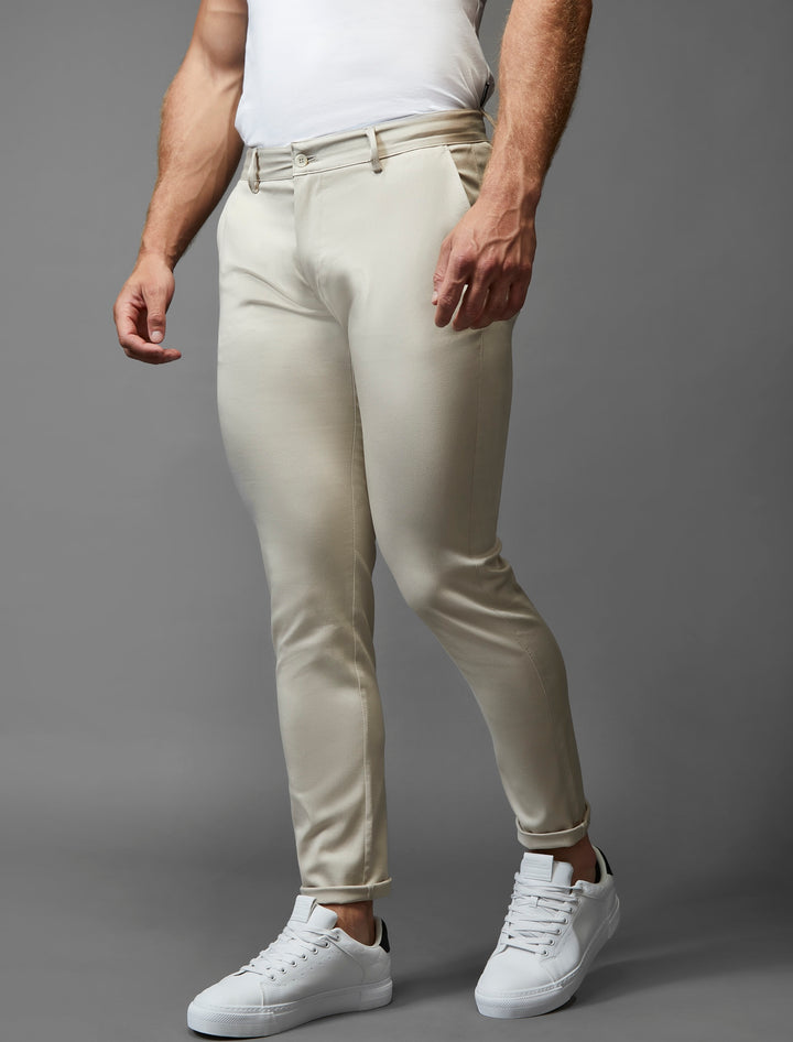 Beige athletic fit chinos by Tapered Menswear, infused with stretch for unparalleled comfort.