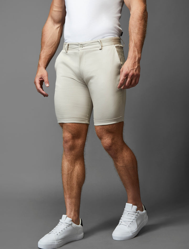 Beige athletic fit chino shorts by Tapered Menswear with added stretch for comfort.