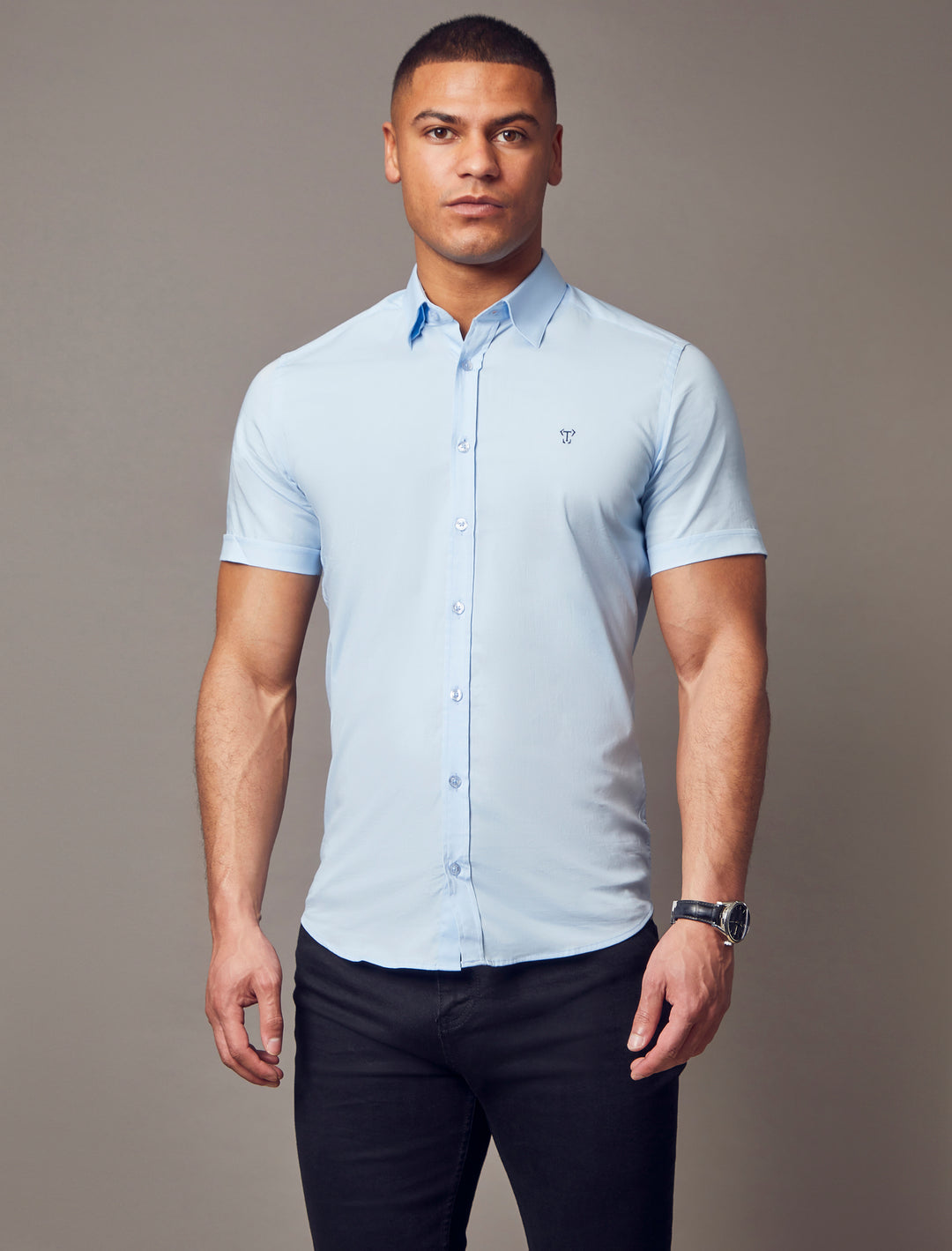 blue muscle fit short sleeve shirt, highlighting the tapered fit and superior quality offered by Tapered Menswear for athletic men
