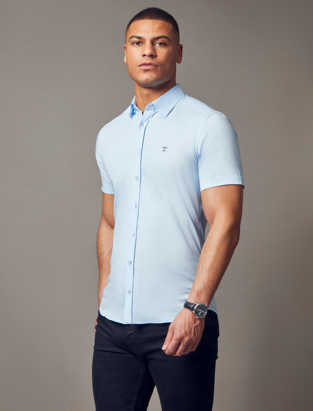 blue short sleeve tapered fit shirt by Tapered Menswear, showcasing the muscle fit design for a comfortable and tailored appearance