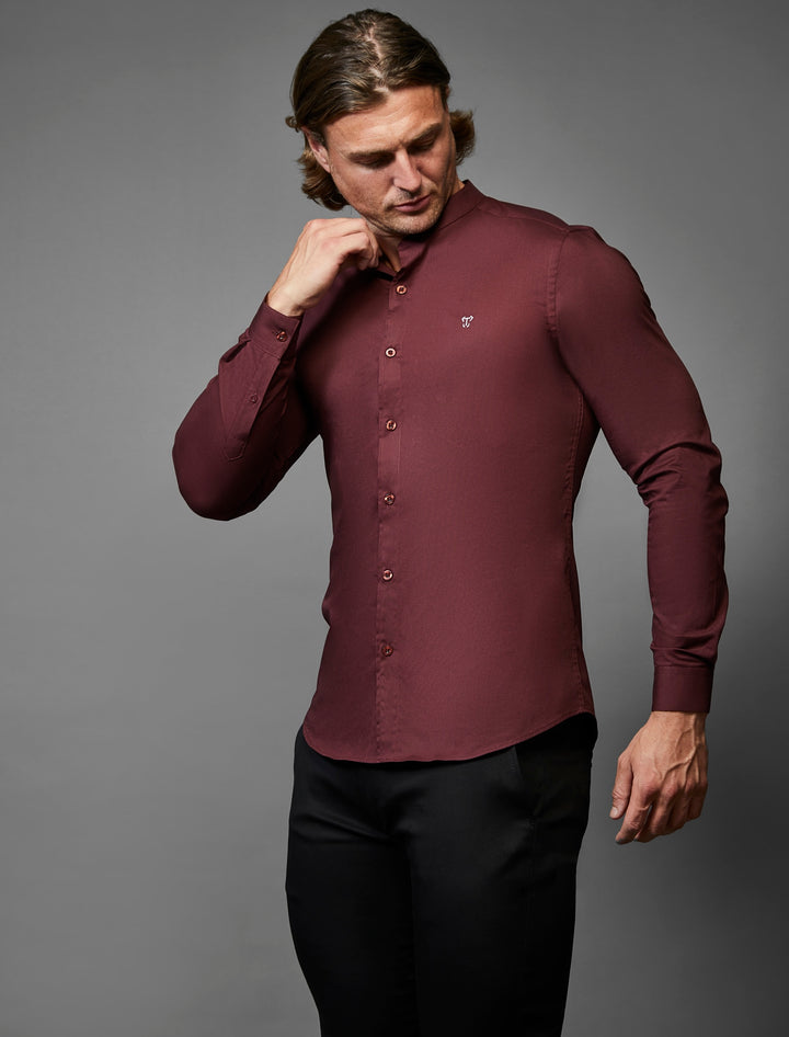 Burgundy grandad collar muscle fit shirt by Tapered Menswear. Tapered Menswear specializes in tailored fits that accentuate the modern man's physique.