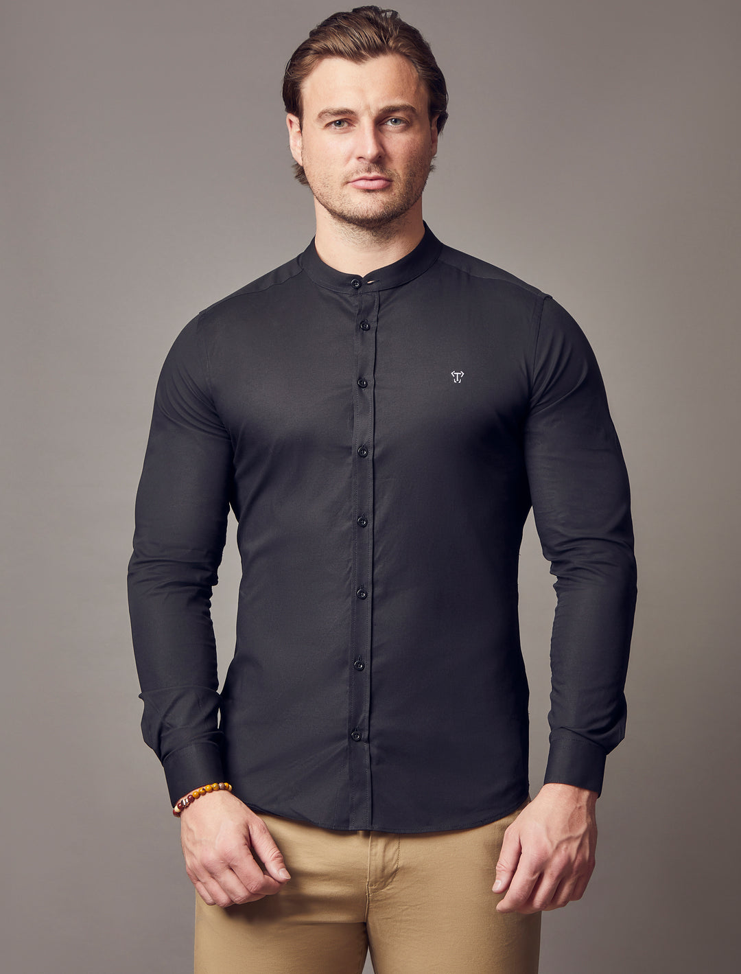 grandad collar black tapered fit shirt, emphasizing the muscle fit features for a flattering and well-sculpted look by Tapered Menswear