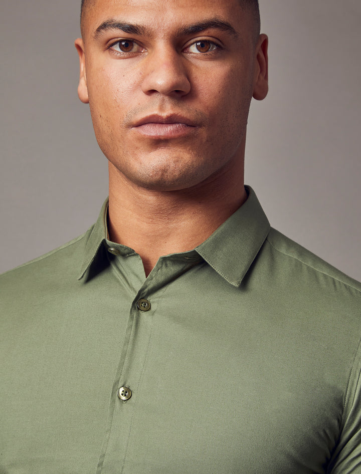 olive tapered fit shirt, showcasing the muscle fit design for an attractive and form-fitting appearance by Tapered