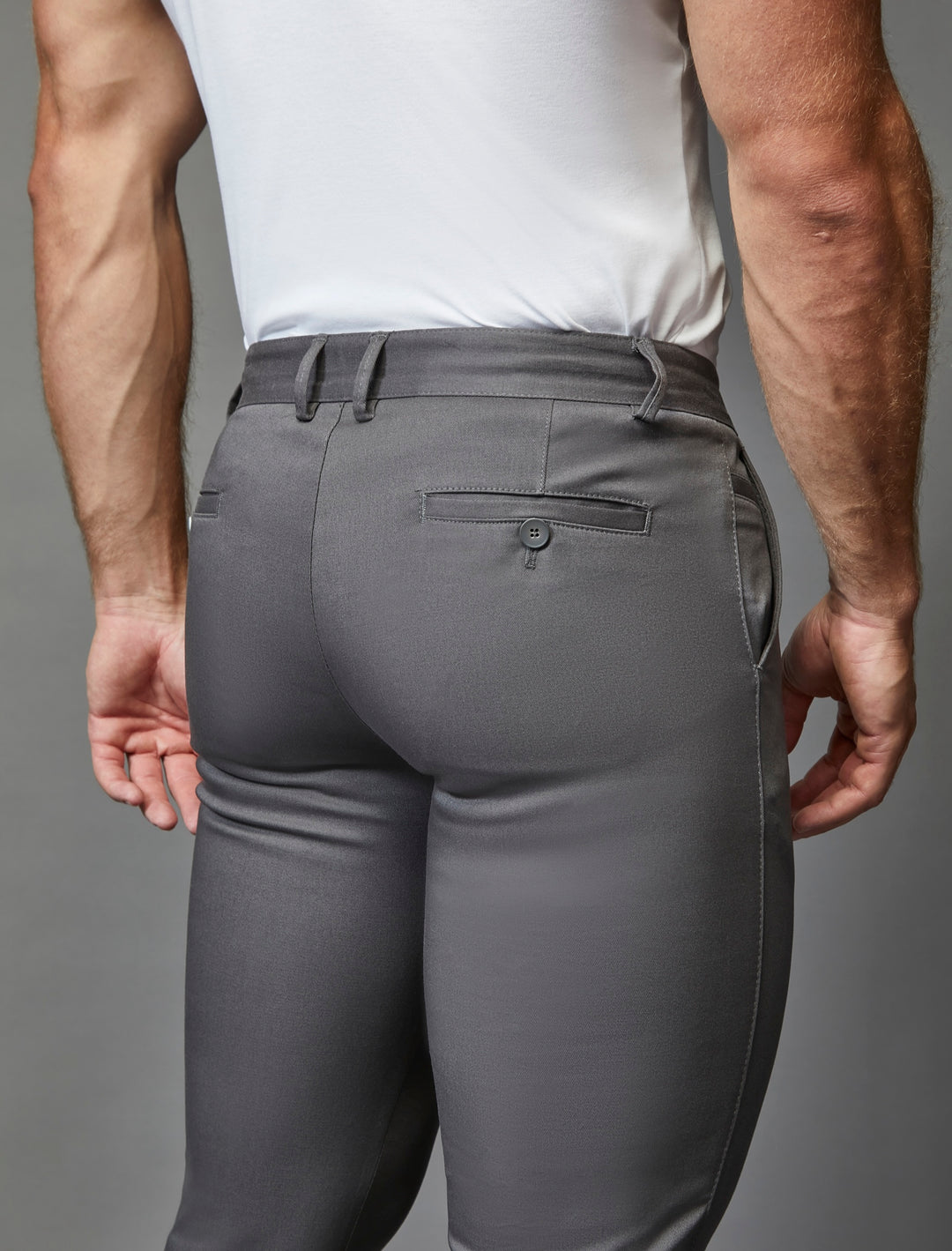 Stretch-enhanced grey chinos in an athletic fit, a signature creation by Tapered Menswear.