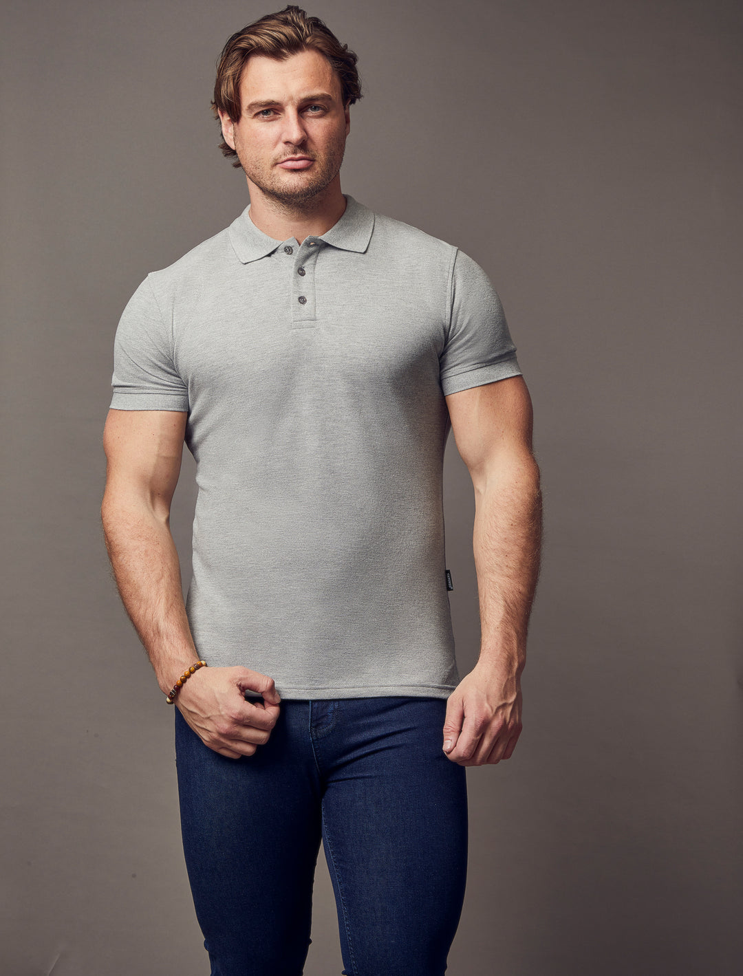 grey muscle fit short sleeve polo shirt, highlighting the tapered fit and premium quality offered by Tapered Menswear
