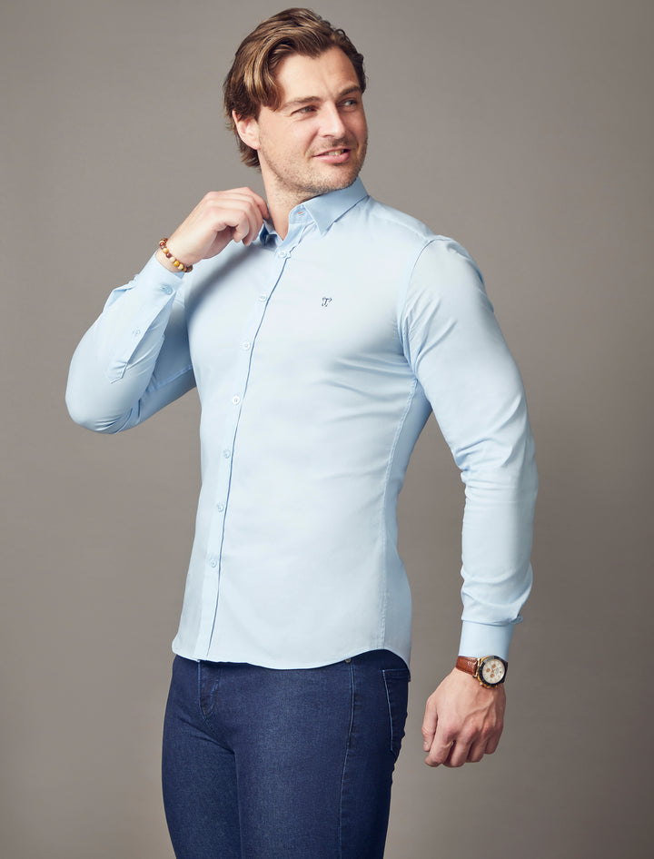 light blue tapered fit shirt, emphasizing the muscle fit features for a flattering and well-defined look by Tapered Menswear