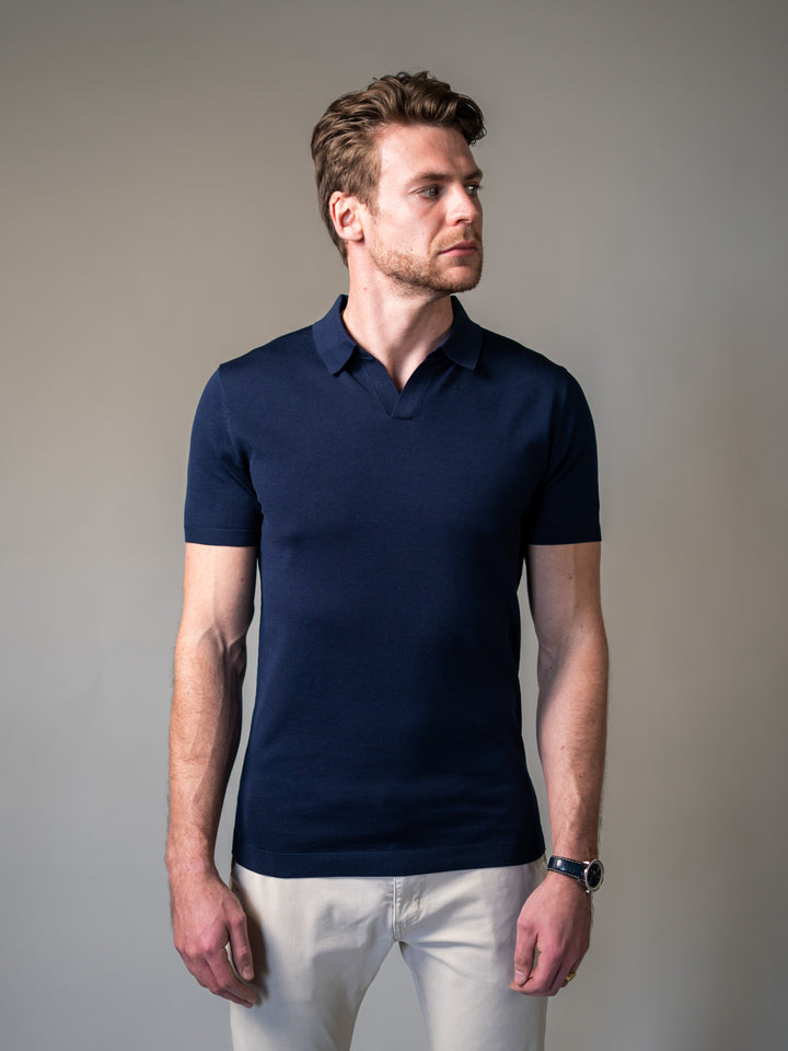 Navy knitted polo with revere collar designed for a true tapered fit