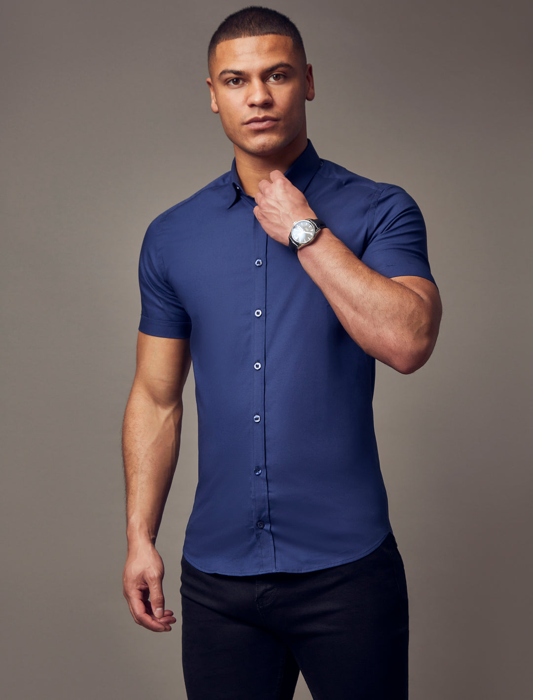 navy short sleeve tapered fit shirt, emphasizing the muscle fit features for a flattering and well-sculpted look by Tapered Menswear