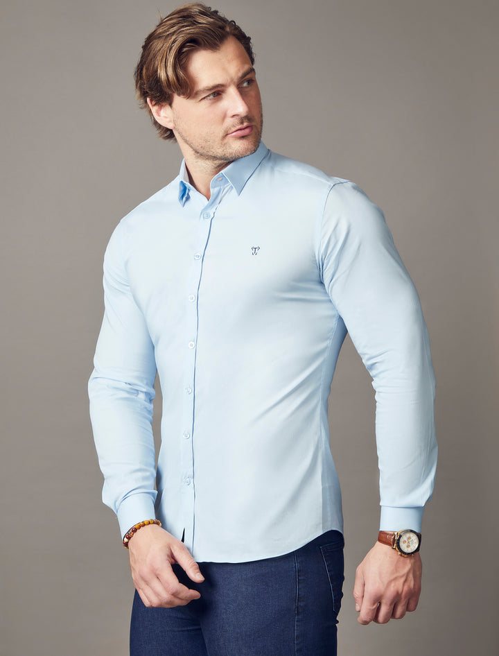 light blue tapered fit shirt by Tapered Menswear, showcasing the muscle fit design for a refined and comfortable silhouette