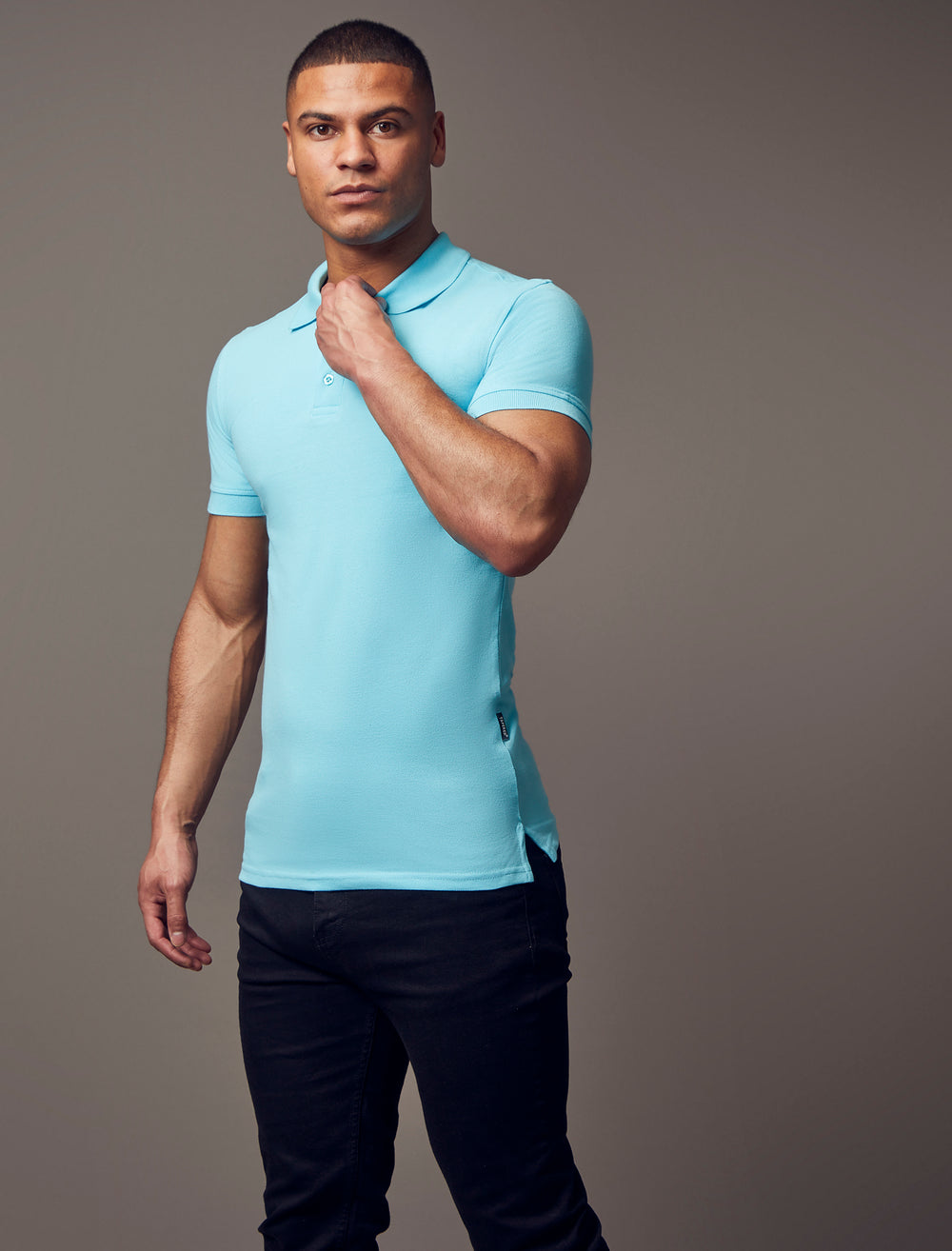 turquoise muscle fit short sleeve polo shirt, highlighting the tapered fit and premium quality offered by Tapered Menswear