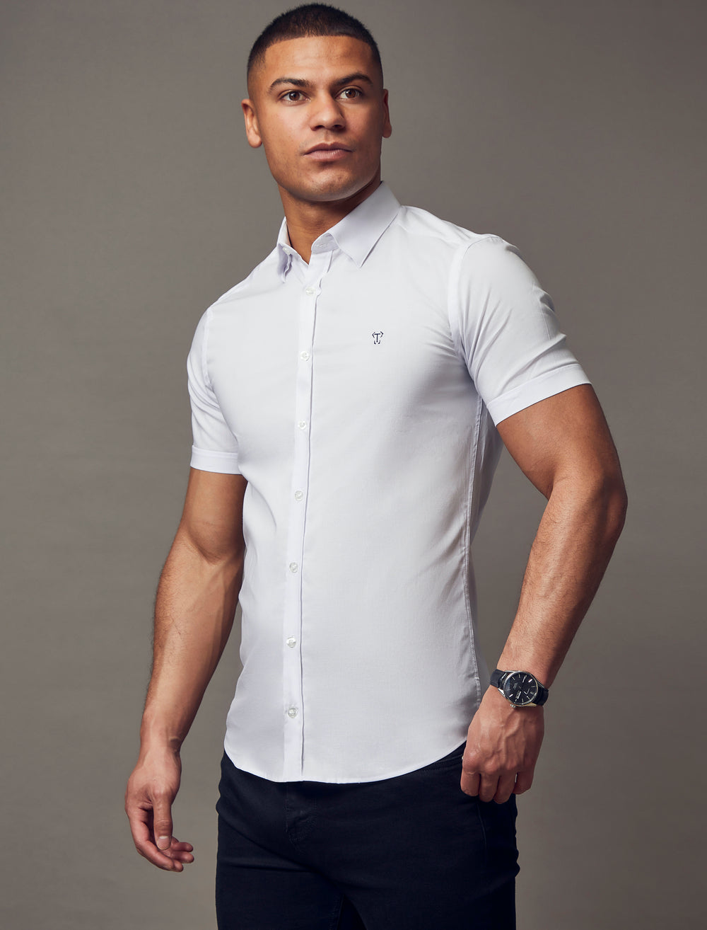 white muscle fit short sleeve shirt, highlighting the tapered fit and premium quality offered by Tapered Menswear