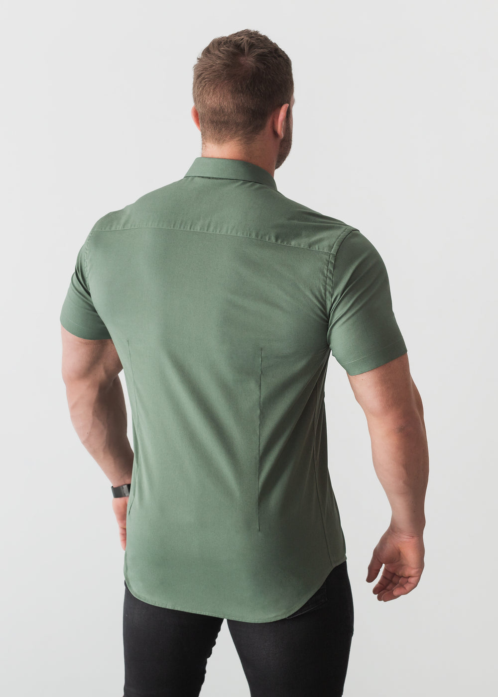 Olive tapered-fit shirt by Tapered Menswear, featuring a muscle-fit design for a flattering and well-defined silhouette.