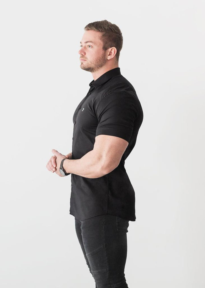 Black Short Sleeve Muscle Fit Shirt. A Proportionally Fitted and Comfortable Muscle Fit Shirt. The Best Shirts For a Bodybuilders