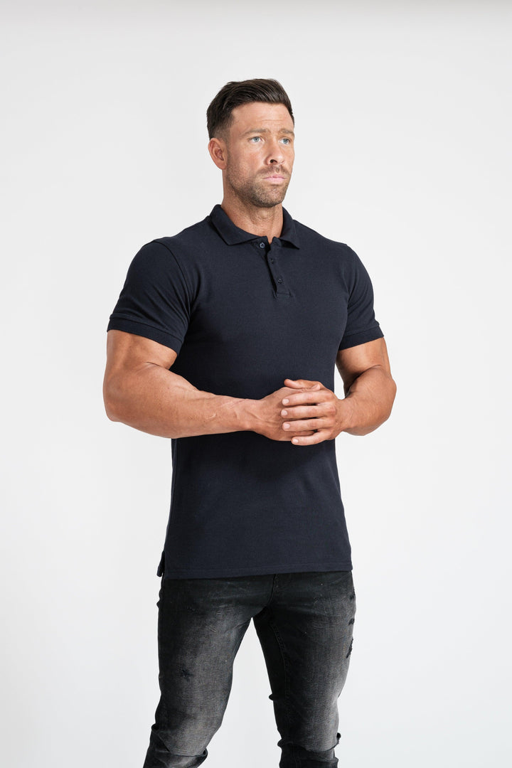 Short Sleeve Navy Muscle Fit Polo Shirt For Men. A Proportionally Fitted and Tight Polo Shirt. Ideal for muscular guys.