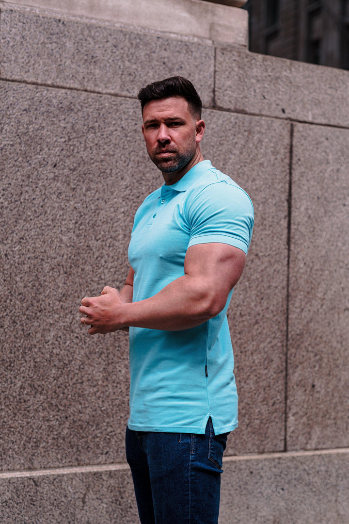 Turquoise Muscle Fit Polo Shirt. A Proportionally Fitted and Muscle Fit Polo short sleeve in Turquoise. Ideal for bodybuilders.