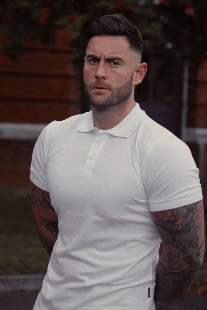 White Muscle Fit Polo Shirt. A Proportionally Fitted and Muscle Fit Polo shirt. Ideal for bodybuilders.