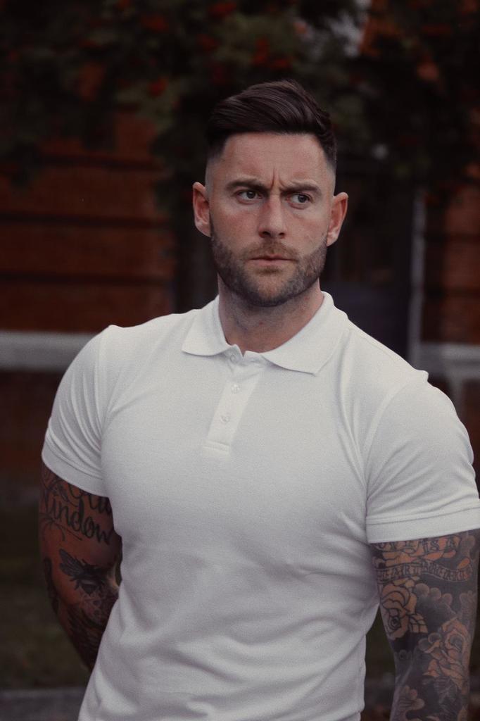 White Muscle Fit Polo Shirt. A Proportionally Fitted and Muscle Fit Polo in White. Ideal for athletes.