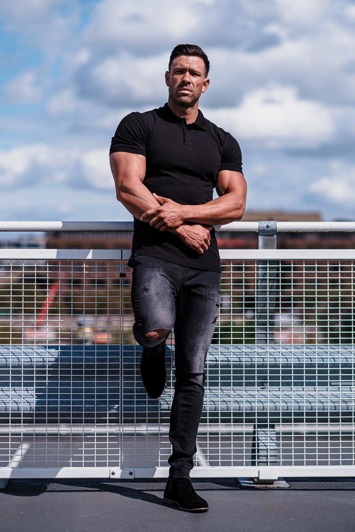 Black short sleeve polo muscle fit. A Proportionally Fitted and Muscle Fit Polo Shirt. Ideal for muscular guys.