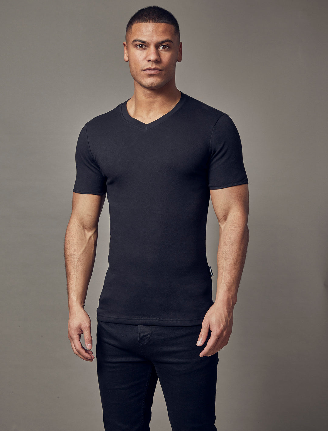 black V-neck tapered fit t-shirt by Tapered Menswear, highlighting the muscle fit design for an attractive and comfortable silhouette