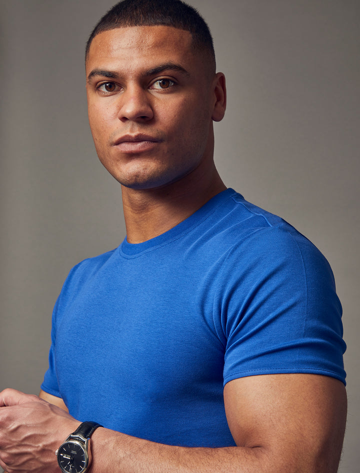 indigo blue tapered fit t-shirt, emphasizing the muscle fit features for a flattering and form fitting look by Tapered Menswear"