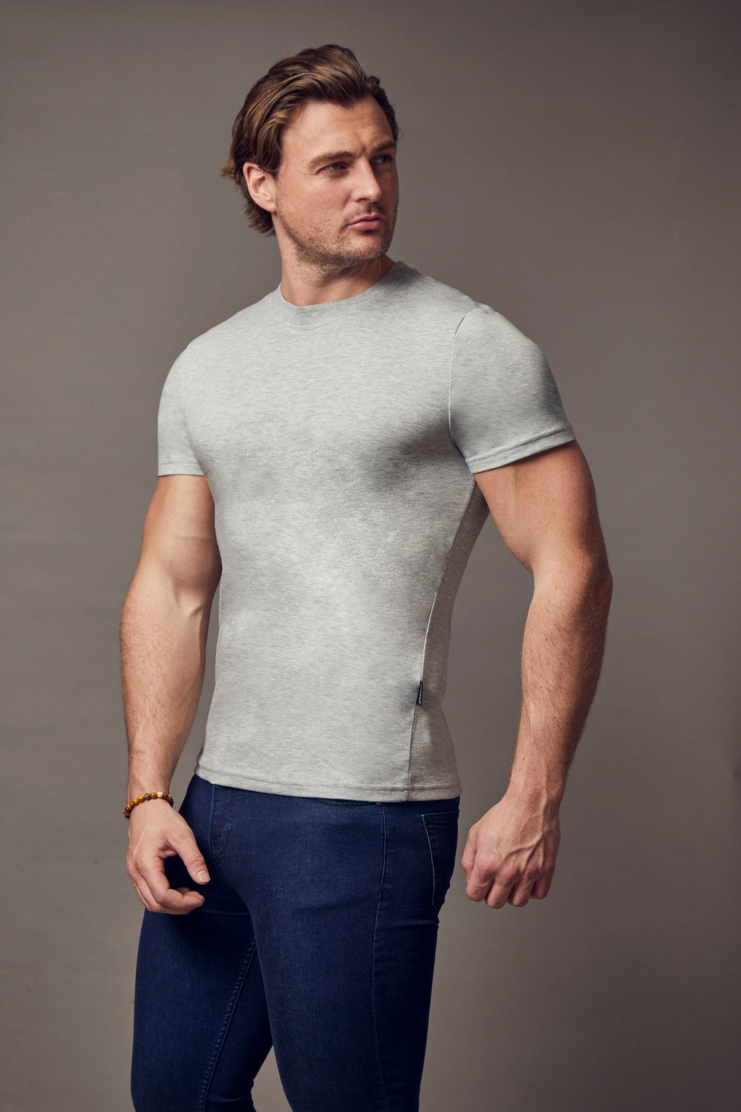 grey tapered fit t-shirt, emphasizing the muscle fit features for a flattering and form-fitting look by Tapered Menswear