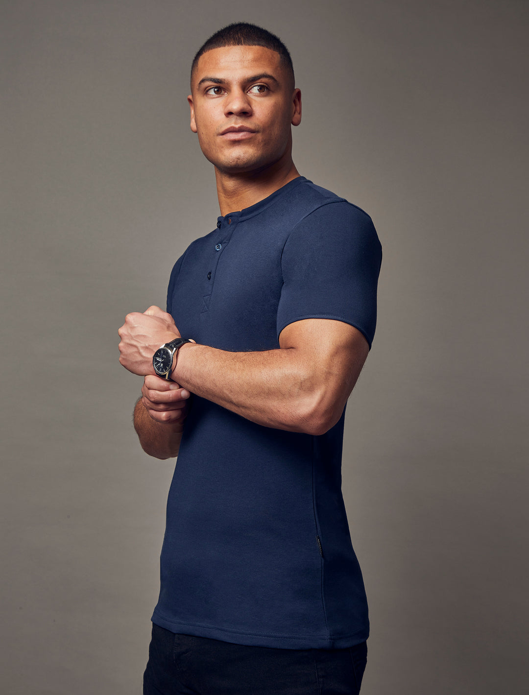navy short sleeve tapered fit Henley, emphasizing the slim fit features for a flattering and form-fitting look by Tapered Menswear