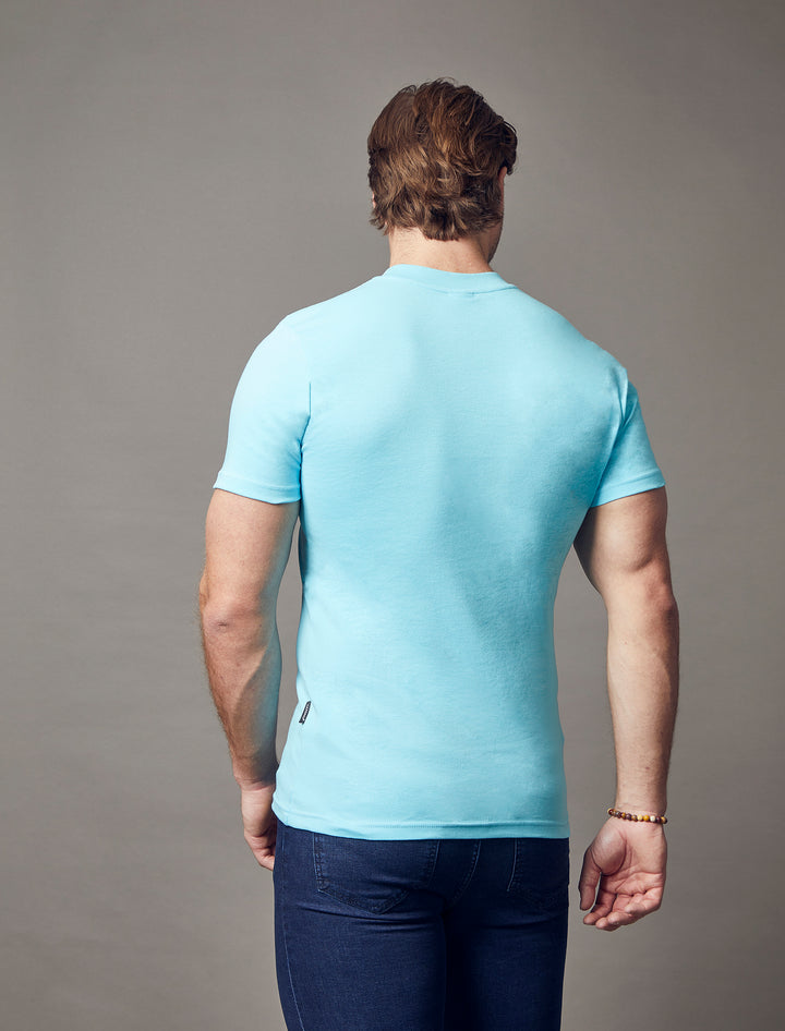 turquoise tapered fit t-shirt, showcasing the muscle fit design for an attractive and form-fitting appearance by Tapered Menswear