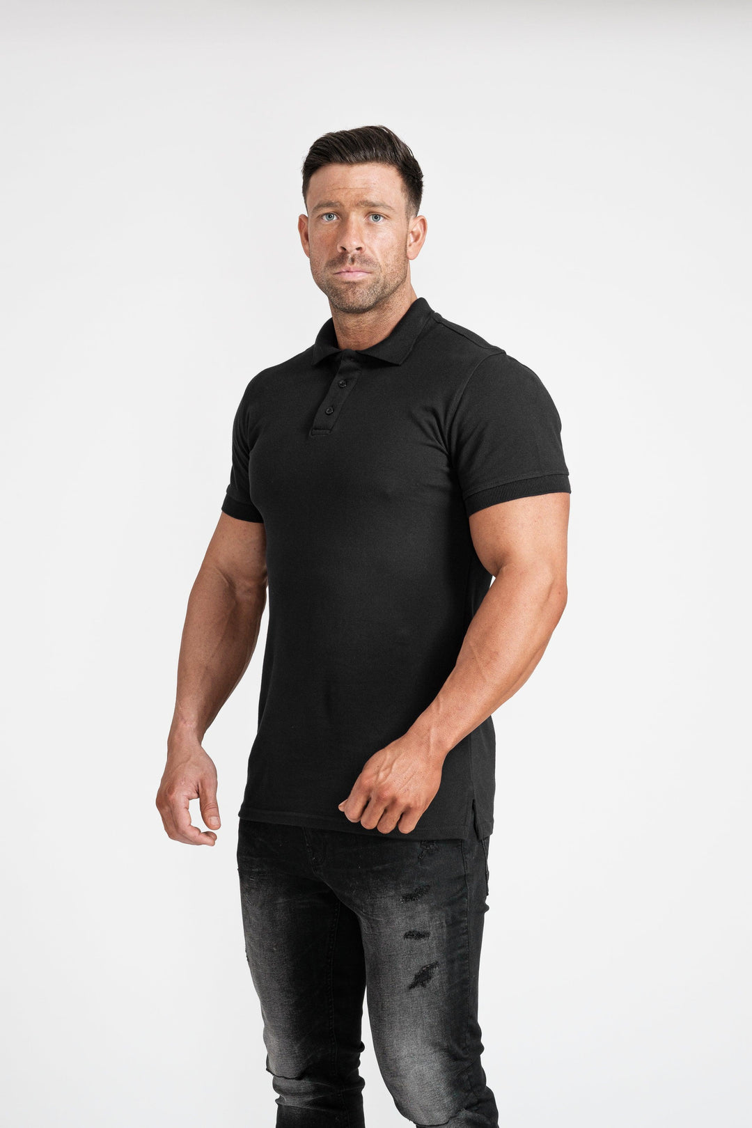Mens Short Sleeve Muscle Fit Polo Shirt. A Proportionally Fitted and Muscle Fit Polo in Black. The best polo shirts for muscular guys.