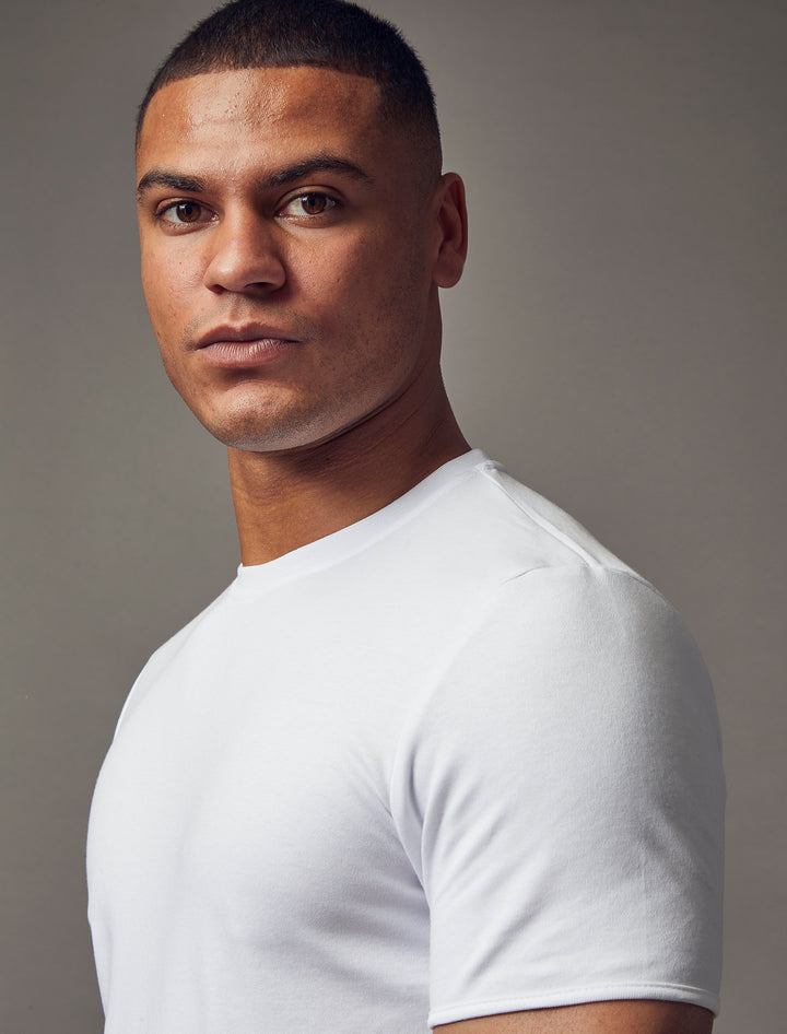 white tapered fit T-shirt, emphasizing the muscle fit features for a flattering and well-defined look by Tapered Menswear