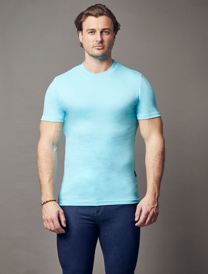 turquoise muscle fit t-shirt, highlighting the tapered fit and premium quality offered by Tapered Menswear
