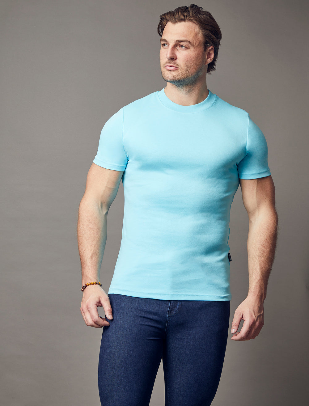 turquoise tapered fit t-shirt, emphasizing the muscle fit features for a flattering and well-defined look by Tapered Menswear