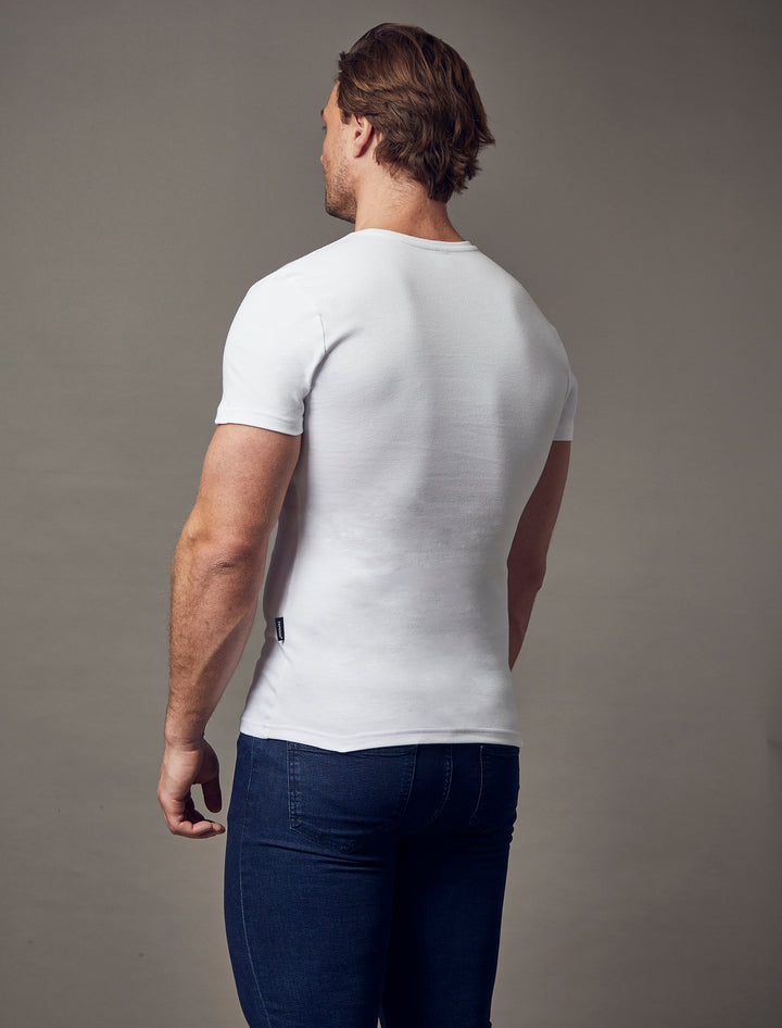 white short sleeve tapered fit Henley, emphasizing the slim fit features for a flattering and well-defined look by Tapered Menswear