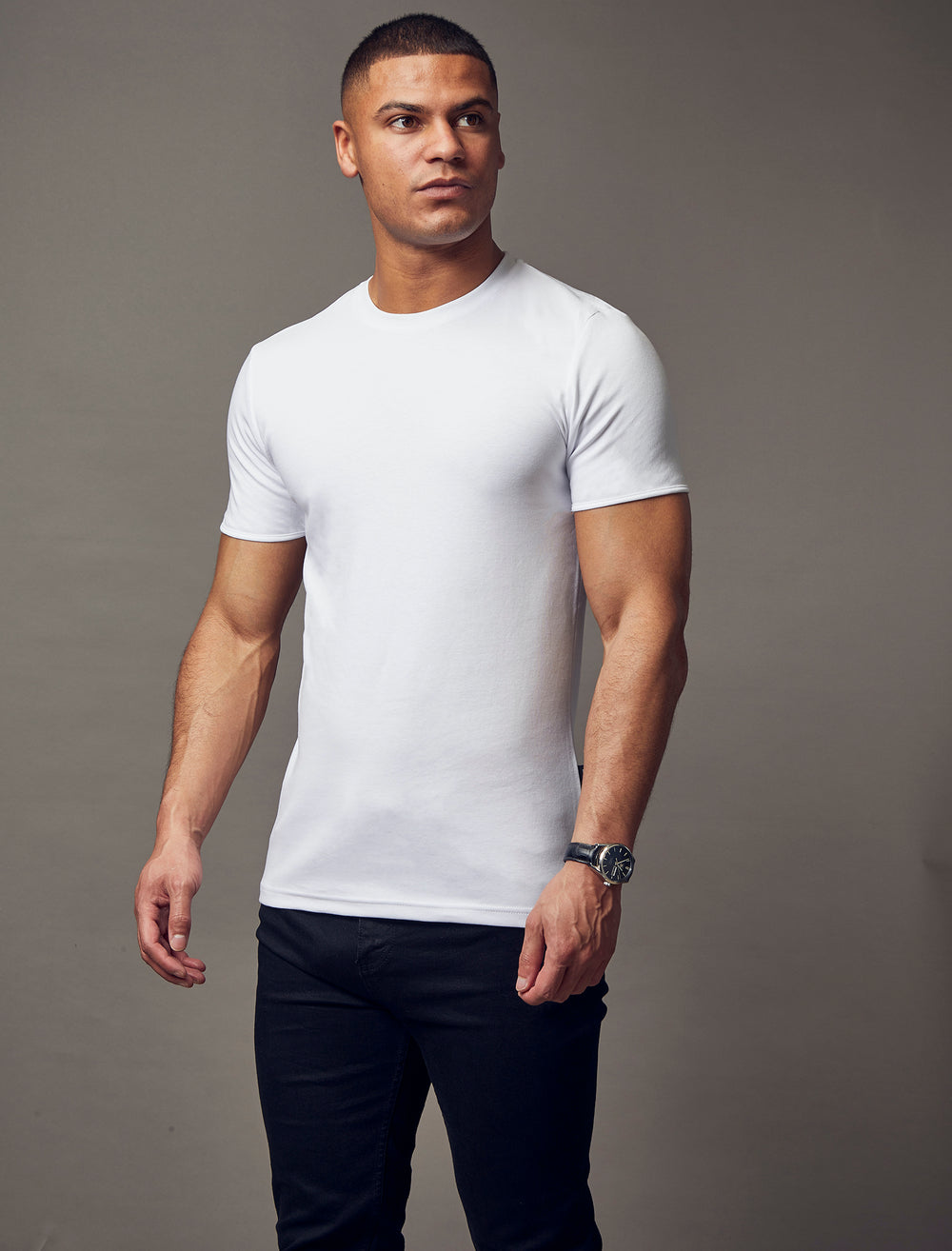 white muscle fit T-shirt, highlighting the tapered fit and premium quality offered by Tapered Menswear